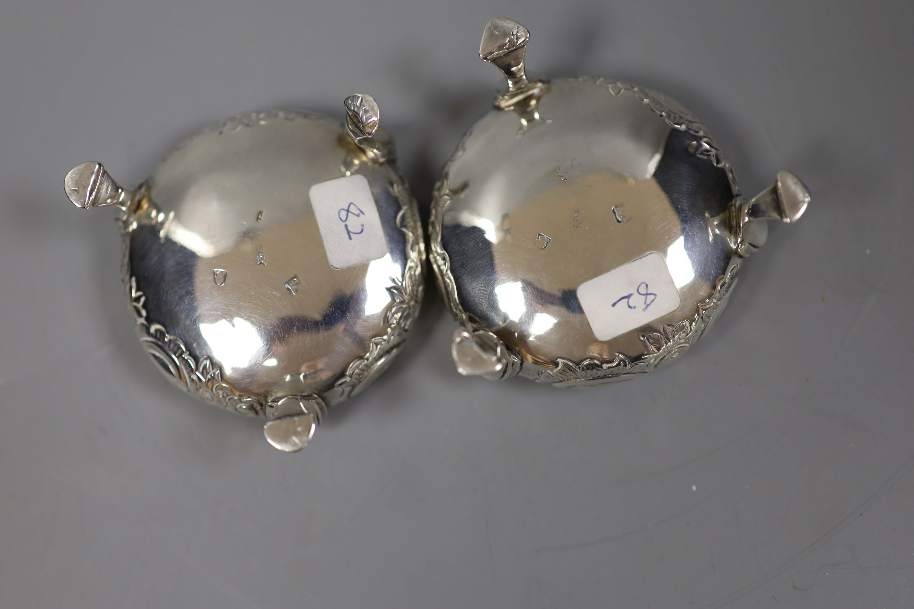 A pair of George III silver bun salts, with later decoration, London, 1766, 66mm, 98 grams.